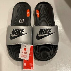 Nike Slides Size 8.  Brand new with tags